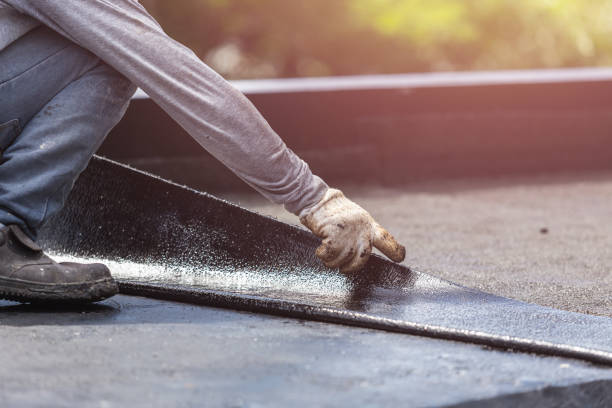Professional Waterproofing technician working in Buckner, KY